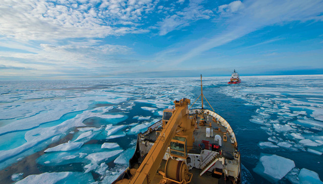 The crew of U.S. Coast Guard Cutter Maple follows the crew of Canadian Coast Guard Icebreaker Terry Fox through the icy waters of Franklin Strait, in Nunavut Canada, August 11, 2017. The Canadian Coast Guard assisted Maple's crew by breaking and helping navigate through ice during several days of Maple's 2017 Northwest Passage transit. U.S. Coast Guard photo by Petty Officer 2nd Class Nate Littlejohn.