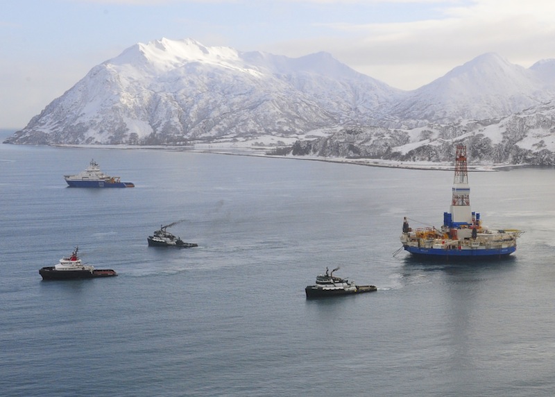 The Aiviq (blue hull) escorts the tugs Corbin Foss, Ocean Wave and Lauren Foss as they tow the conical drilling unit Kulluk from Kiliuda Bay near Kodiak Island, Alaska, Feb. 26, 2013. The Kulluk is being towed to Dutch Harbor where it will be loaded aboard a heavy lift vessel for transport to Asia. U.S. Coast Guard photo by Petty Officer 1st Class Sara Francis.